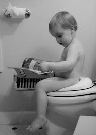 toddler reading on potty